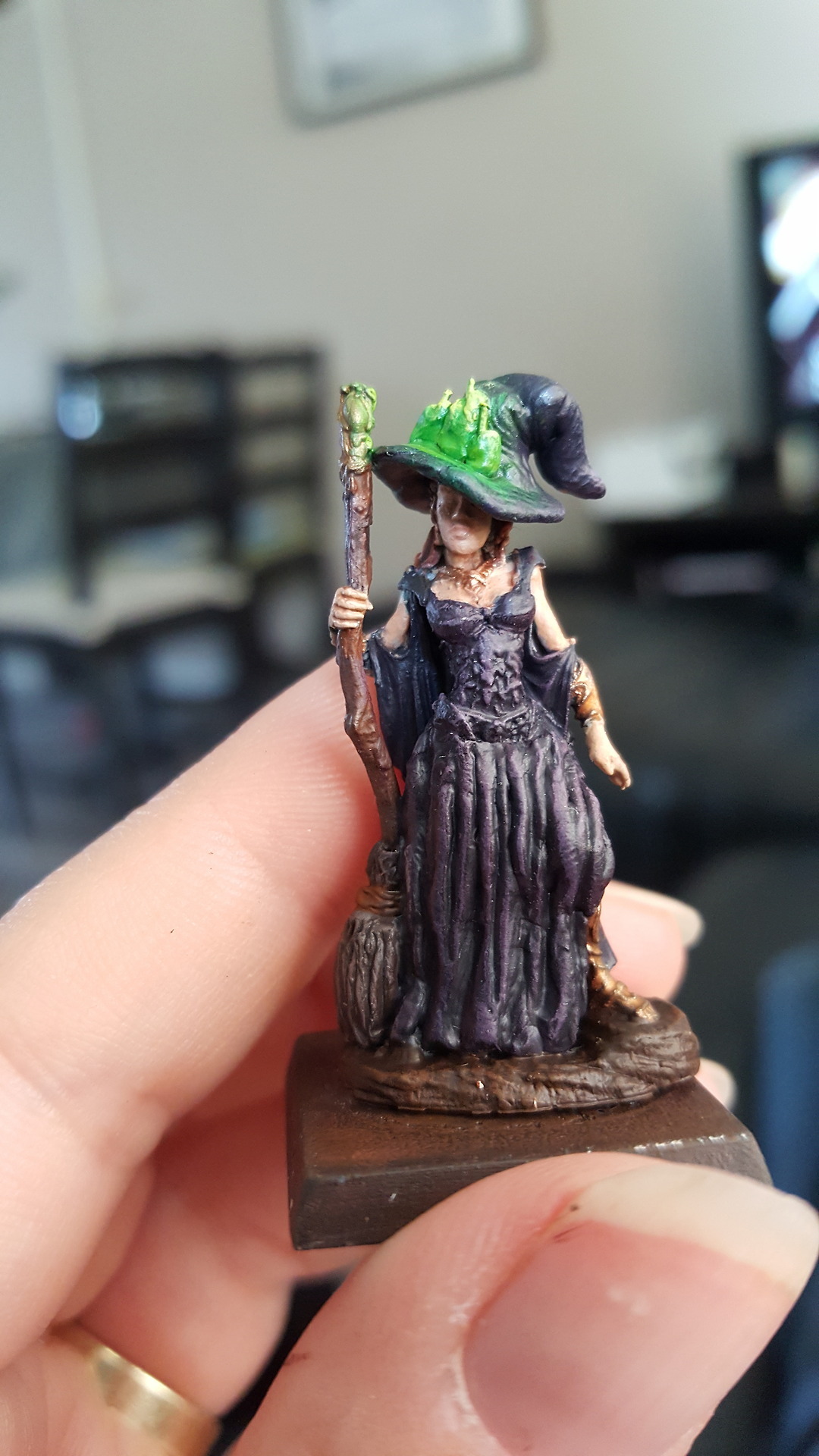 front view of the mini now painted. The fabric is all in purples and the candles are everburning.